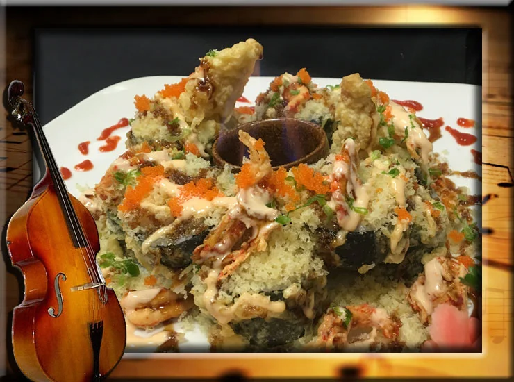 Volcano Roll - Baked roll topped with spicy creamy sauce